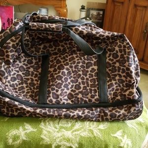 Leopard print duffle bag.